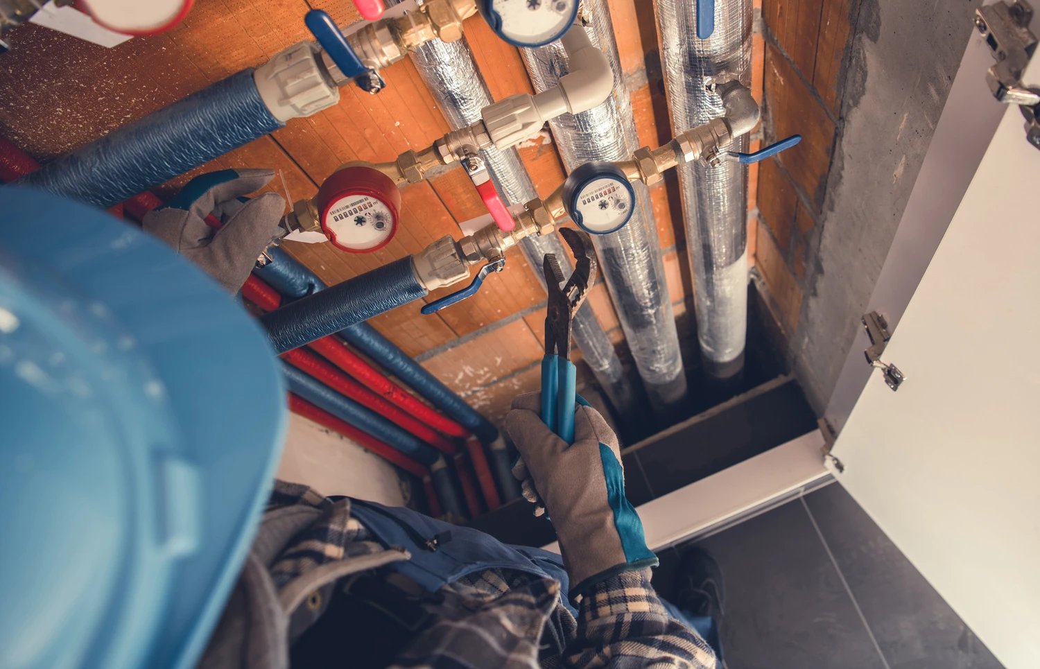 Professional plumber at work
